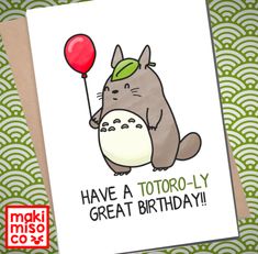 a card with an image of a totoro holding a red balloon in it's hand