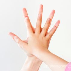 a person holding their hand up in the air with both hands extended out to reach something