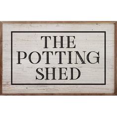 a wooden sign that says the potting shed on it's side, in black and white