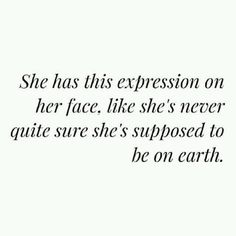 an image with the words she has this expression on her face, like she's never quite sure she's supposed to be on earth