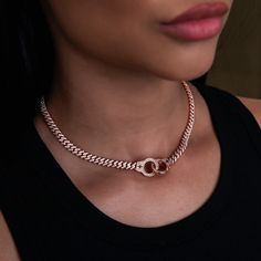 Elevate your style game with the Iced Handcuff Diamond Prong Cuban Necklace. This 14k Rose Gold piece features an iced out Cuban chain connecting two pave handcuffs, each accented with our signature GLD star. Designed to elevate your look in an instant, pair it with the matching bracelet for the perfect set! This product is guaranteed for life - GLD will repair the item should you experience any defects in craftsmanship or breakage. Specifications - Length: 16", 18", 20", & 22" - Width: 6mm - We Cuban Necklace, Gold Piece, Vermeil Jewelry, Matching Bracelet, Custom Earrings, Cuban Chain, Matching Bracelets, Drop Necklace, Pendant Bracelet