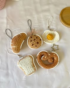 four crocheted ornaments are arranged on a white tablecloth, with instructions to make them