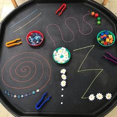 a black tray topped with lots of different items