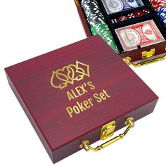 an open wooden box with poker cards in it