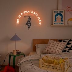 there is a neon sign above the bed