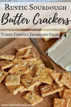 some crackers are sitting on a cutting board