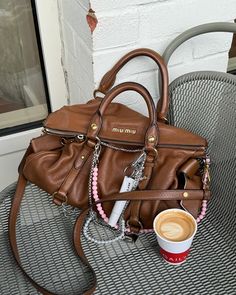 Busy clacking my keychains away⚡️💕 #miumiubag #janebirkinstyle #bagstyle School Crossbody Bag, Leather Crossbody Bag Outfit, Outfits With Bags, Bag With Charms, Fall Purses, Jane Birkin Style, Bag Styling, Dream Wishlist, Vintage Designer Handbags