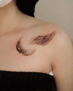 a woman's chest with an angel wing tattoo on her left shoulder and right breast