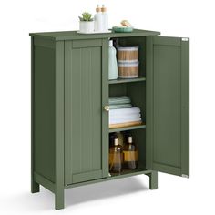 a green cabinet with towels and other items in it