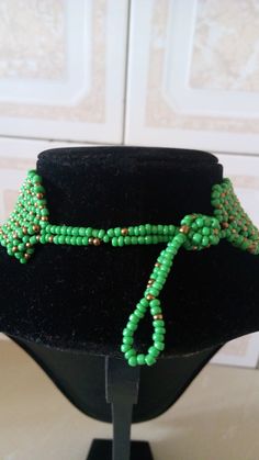 Green Choker | Custom Necklace | Layering Necklace | African Jewelry | Multistrand Necklace | Bib Necklace | Birthday Gift | Custom This statement necklace is made from beads. Main Color - Green. Feel free to send me a convo or e-mail for any clarification or more information. Thank you for visiting, Handmade Green Beaded Choker Necklace, Handmade Green Choker With Round Beads, Green Handmade Round Beads Choker, Unique Green Beaded Choker, Unique Green Beaded Necklaces With Tiny Beads, Unique Green Beaded Necklace With Tiny Beads, Green Choker, Necklace African, Wholesale Necklaces