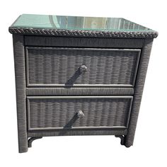 an image of a wicker nightstand with glass top