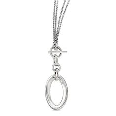 Modern and sophisticated, this fashion necklace offers an instant update. Created in sterling silver, this design features an open oval-shaped drop. The double fancy chain loops around the neck, securing in front with a toggle clasp. A great look anytime, this 17.0-inch necklace is finished with a bright polished shine. Delicate Jewelry Necklace, Geometric Silver Jewellery, Diy Jewelry Necklace, Layered Chain Necklace, Chain Loop, Toggle Necklace, Tiffany Jewelry, Shell Jewelry, The Double