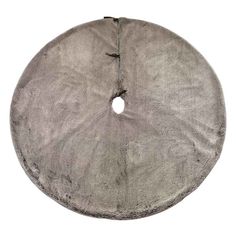 a round grey rug with holes in the middle on a white background for use as a floor cushion