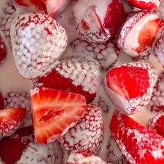 strawberries and cream are mixed together in a bowl