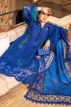 Brand: Maria.BProduct Code: D-2404-BCollection: Maria.B Unstitched Embroidered Luxury Lawn CollectionFabric: Lawn DESIGN DETAILS: ShirtEmbroidered Organza Neck Patch Left & RightEmbroidered Front PatchEmbroidered Lawn Side Panels Left & RightDyed Back & SleevesEmbroidered Organza Sleeves PatchEmbroidered Organza Sleeves PattiEmbroidered Organza Ghera Patti DupattaBurnout Silk DupattaEmbroidered Organza Dupatta Patti TrousersDyed Cambric TrouserColor: Blue CARE INSTRUCTIONS: Extra Fabric Has Been Used For Shoot Original Color May Vary Slightly From The Picture Dry Clean Recommended Iron The Clothes At Moderate Temperature Do Not Use Bleach, Or Stain Removing Chemicals Damp Fabric Should Not Be Exposed To Sunlight DISCLAIMER:* Lining, Laces, and Tassels are not included in unstitched variant Maria B Lawn, Pakistani Boutique, Pakistani Designer Clothes, Pakistani Lawn Suits, Organza Sleeves, Unstitched Dress Material, Beautiful Pakistani Dresses, Maria B, Pakistani Wedding Dresses