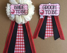 two ribbons with the words bride to be and groom to be written on one side