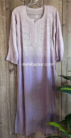 "Chikankari kurta on fine flowy georgette. Beautifully hand embroidered! Liner included. Kurti length-47 inches \"Embroidery designs vary \"" Ombre Chikankari Kurti, Bohemian Straight Kurta With Cutwork, Long Georgette Kurta With Intricate Embroidery, Bohemian Embroidered Georgette Kurta, Bohemian Georgette Kurta With Dabka Work, Bohemian Kurta With Floral Embroidery In Georgette, Bohemian Cutwork Kurta For Festive Occasions, Bohemian Long Sleeve Kurta With Cutwork, Transitional Chikankari Embroidered Georgette Kurta