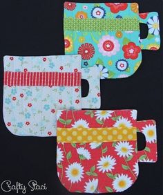 four pot holders with flowers on them and one has a zippered pocket for the bottom