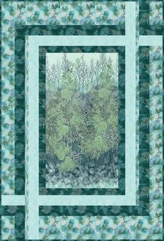 a green and blue quilt with trees on it