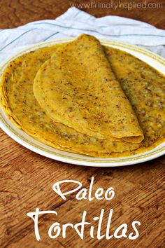 three tortillas on a plate with the words paleo tortillas