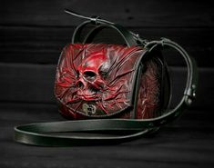 High quality handmade leather women's bag with skull for everyday use. The bag by KUGENKO leatherworks in Leather Captivity style displays your personality. Made of red leather and manually stitched. It is the perfect combination of beauty and functionality. There 1 main compartment and 1 pocket. Folded size: height 16 cm, width 22 cm, thickness 8 cm + 3 cm skull. The color in the photo may differ slightly from the color of the finished product. Write to me if you have questions! More our produc Cartoon Character Costume, Skull Bags, Art Landscapes, Black Leather Backpack, Side Bags, Nice Leather, Bel Air, Handmade Leather, Leather Clutch