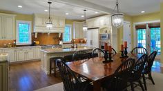 a large open kitchen and dining room area