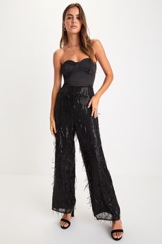 The most glamorous way to elevate any late-night look is with the Lulus Shimmery Aura Black Sequin Fringe High-Rise Wide-Leg Pants! Dazzling fringe-y sequin details adorn these mesh pants that feature a flattering high-rise fit and trendy wide pant legs that fall to full-length hems. Hidden side zipper/clasp. Pair with an equally shiny pair of heels for a truly stunning look! Fit: This garment fits true to size. Length: Ankle length. Size medium Inseam: 29.00 Front Rise: 12.50 Waist: Fitted - ve Glamorous Fitted Pants For Gala, Elegant Bottoms For Night Out During Party Season, Fitted Sequin Bottoms For Gala, Elegant Sequinned Bottoms For Night Out, Glamorous Long Pants For Party, Elegant Sequined Bottoms For Holiday Party, Elegant High Waist Sequin Bottoms, Elegant High-waist Sequined Bottoms, Elegant Full-length Bottoms For Night Out