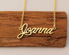 "Name Necklace, Dainty Necklace, Personalized Name Necklace Gold, Tiny Name Necklace Christmas Gift for Joanna This necklace is made of Stainless Steel Available color: Gold, Silver and Rose Gold Chain Length: 14\"16\"18\"20\"22\" inches Processing Time: 2-10 business days Standard Shipping: 10-15 business days to USA. 15-30 business days to other countries. Expedited Shipping: 5-8 business days to USA. 5-10 business days to others. Please do not hesitate to contact us with any concerns." Gold Name Necklace For Party Gift, Gold Name Necklace For Party And Gift, Gold Name Necklace For Party And Gift Occasions, Adjustable Personalized Necklace For Parties, Custom Name Pendant Necklace For Party, Customized Necklace For Mother's Day Party, Gold Nameplate Necklace For Christmas, Custom Name Gold Necklace For Christmas, Personalized Gold Charm Necklaces For Christmas