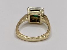 Welcome To Gold Knox Beautiful 14K yellow solid gold with diamonds and emerald women's ring. The green emerald is set in bezel setting surrounded by channel setting set with diamonds. Great gift for any occasion!! Details below: Material 14K yellow gold, diamond ,emerald Weight 5.8 gm Size US 6 1/4 Hallmark 14K This would make great addition to your vintage collection. Thank you for looking Gold Knox opened its storefront in Pasadena, CA in 2011, since then we have an online store on eBay, and w Formal Yellow Gold Emerald Ring Channel Set, Gold Emerald Ring With Channel Set Emerald Cut, Emerald Statement Ring, Light Blue Gemstone, Emerald Gem, Channel Setting, Green Emerald, Photo Bracelet, Quality Diamonds