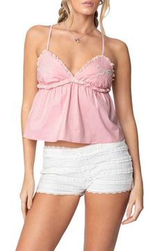 Channel irresistible retro style in this babydoll top featuring bow embroidery and delightful ruffle details. Sweetheart neck Adjustable straps 100% cotton Machine wash, dry flat Imported Feminine Pink Camisole With Ruffled Straps, Pink Ruffled Camisole For Summer, Pink Ruffled Spaghetti Strap Camisole, Feminine Cotton Tops For Pajama Party, Pink Ruffled Camisole, Feminine Tops For Summer Pajama Party, Sweet Pink Summer Tops, Sweet Pink Summer Top, Cute Ruffled Cami Top