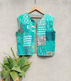 Indian Handmade patch work Jackets, Coats, Boho ,Quilted, For Women`s Made In India Size - All Size WE INCREASE SIZE MEASURE AND UPDATED Small Size - Chest -38 inch Length- 20.5 inch Sleeves - less Medium Size - Chest-40 inch Length- 20.5 inch Sleeves -less Large Size - Chest- 42 Inch Length- 21 inch Shoulder -17 inch Sleeves -less XL Size - Chest -44 inch Length - 21 Inch Shoulder-18 inch Sleeves - less XXL size Chest- 46- inches Length -22 inches Shoulder-18.5 inch Sleeves - less XXXL size Chest- 46- inches Length -22 inches Shoulder-18.5 inch Sleeves - less Handmade... For the very reason that each item has been handmade there is always an element of human error, whether it be a missed stitch or overlapping block print design. Yet for us the beauty is in the imperfection. These are the Green Patchwork Vest For Spring, Spring Green Patchwork Vest, Silk Tank Dress, Ladies Short Jackets, Handmade Patch, Quilted Patchwork, Kantha Jacket, Patchwork Jacket, Silk Tank