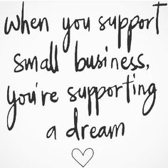 a sign that says when you support small business, you're supporting a dream