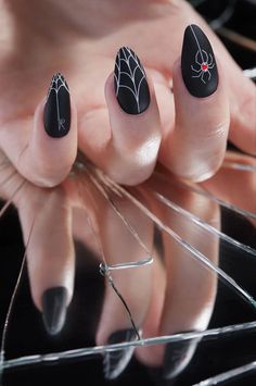 🎃 Get ready to spookify your nails this Halloween with these wickedly cute designs! 💅🏼 From creepy crawly spiders to ghostly ghouls, these nail art ideas will have you howling with delight. #HalloweenNails #NailArt #SpookySeason #TrickOrTreatYoSelf #GhoulishGlam #WitchyVibes #Boo-tifulNails #FangtasticManicure #NailGoals #HalloweenHype 🕷️👻🎃 Black Goth Nails, Black Widow Nails, Stiletto Press On Nails, Rave Nails, Short Stiletto, Ideas Uñas, The Black Widow, Gothic Nails