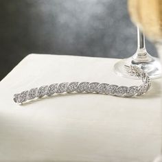 Ross-Simons - 1.00 ct. t. w. Diamond Bracelet in Sterling Silver. 8". Alight with 1.00 ct. t. w. baguette and round brilliant-cut diamonds, our twinkling bracelet is the epitome of elegance. Set in polished sterling silver, it's not only dazzling - it's affordable, too! Figure 8 safety. Box clasp, diamond bracelet. Diamond birthstones are the perfect gift for April birthdays. Classic Sparkling Diamond Bracelet For Anniversary, Sparkling Diamond Bracelet For Anniversary, Sparkling Round Diamond Bracelet For Anniversary, Elegant Diamond Bracelet With Handset Stones For Anniversary, Sparkling Diamond White Bracelet For Anniversary, Classic Sparkling Tennis Bracelet For Anniversary, Anniversary Diamond White Sparkling Tennis Bracelet, Sparkling White Gold Tennis Bracelet For Anniversary, Anniversary Crystal Bracelet With Prong Setting