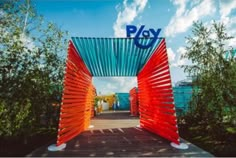 the entrance to play is painted bright orange and blue