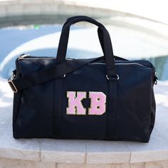 "dupe - personalized duffle bag - gym bag - basketball bag - duffle bag Our Duffle Bag Personalized is a one of a kind Weekender Bag Gift for Her - Monogrammed with Patches, our Duffle Bag for Women is that Unique Gift that's not only thoughtful, but a holiday Christmas gift she'll use all the time! Our nylon duffle bags come in a gorgeous pastel tie die, and solid black - choose which suits her best. Co Worker Christmas gifts are sometimes hard to find, but our high quality duffle bags with a l Sporty Personalized Sports Bag, Sporty Travel Bag With Embroidered Logo, Sporty Personalized School Bag, Personalized Sporty School Bag, Sporty Personalized Bag For Sports Events, Customizable Sporty School Bags, Personalized Sporty Bags For Sports Events, Sporty Customizable School Bags, Functional Rectangular College Bags