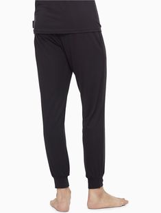 Breathable ultra-soft modal stretch. Crafted from responsibly sourced modal, these Calvin Klein joggers are designed with a super soft recycled logo waistband, front slip pockets and banded cuffs for a snug fit.  Material: 87% Modal, 13% Elastane. Calvin Klein Loungewear, Recycled Logo, Calvin Klein Sweatpants, Calvin Klein Joggers, Modern Lounge, Womens Wellness, Eco Conscious, Women's Fitness, Designer Outfits Woman