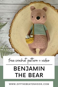 a crochet teddy bear sitting on top of a tree stump with text overlay reading free crochet pattern and video benjamin the bear