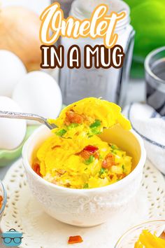 a bowl filled with food sitting on top of a white doily next to eggs