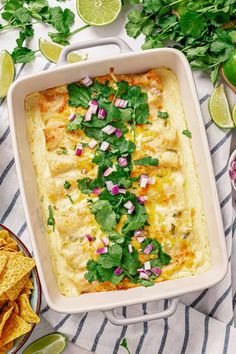 an enchilada dish with cilantro and onions