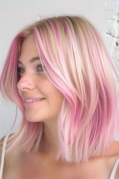 Bubblegum Pink Streaks on Platinum Blonde Hair Color Idea. Short Blonde With Pink Highlights, Blonde Bob With Pink Highlights, Blonde With Bright Colors Fun, Short Blonde Hair Pink Highlights, Hair Color With Pink Highlights, Colorful Highlights In Blonde Hair, Pink And Blonde Short Hair, Pink Hair Ideas For Blondes, Pink Tip Hair