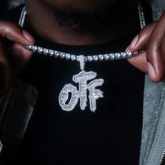 Introducing the GLD x Lil Durk exclusive collaboration- the ‘Only the Family’ Collection. This exclusive pendant is thoughtfully designed to celebrate the Grammy-award winning artist’s presence in rap culture, deeply embedded in music and style. Featuring the OTF letters in diamond baguette hand-set stones and crafted in 14k White Gold, the Original OTF Logo Pendant represents family unity. Paired perfectly with the 5mm Diamond Tennis Chain, this piece is guaranteed to reflect light across the r Otf Logo, Rap Culture, Family Unity, Diamond Baguette, Lil Durk, Tennis Chain, Vermeil Jewelry, Custom Earrings, Grammy Awards