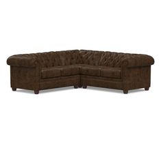 a brown leather sectional couch on a white background