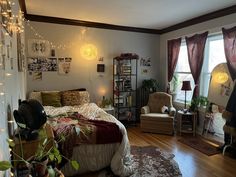 the bedroom is decorated with lights and decorations