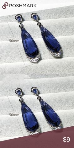 Long Earring Blue Water Drop Crystal Sliver Luxury Long Earring Blue Water Drop Crystal Sliver For Women Fashion Jewelry 100% Brand New High Quality !  Style : Classic  Material :  Crystal  Color : Blue  Size : Earrings  4.9 * 0.9 cm  Package include : 1pair Earrings     Occasion : Engagement, Wedding, Holiday, Birthday, Party, Gifts, etc. hand crafted Jewelry Earrings Formal Blue Crystal Earrings, Blue Sterling Silver Earrings For Evening, Silver Sapphire Earrings For Party, Blue Sterling Silver Crystal Earrings For Formal Events, Blue Sterling Silver Crystal Earrings For Formal Occasions, Elegant Blue Drop Crystal Earrings, Blue Teardrop Crystal Earrings For Evening, Blue Drop Crystal Earrings For Party, Blue Sterling Silver Earrings For Party