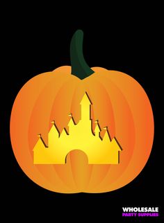 an orange pumpkin with a castle cut out of it