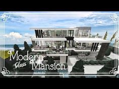 the modern glass mansion is on display in this video game, which features an ocean view and