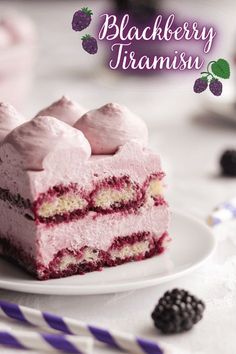 a piece of cake on a plate with berries and strawberries in the background that says blackberry tramsna