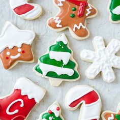 christmas cookies decorated with icing and candy canes