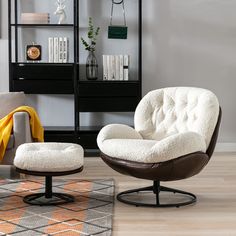 a chair and ottoman in a living room